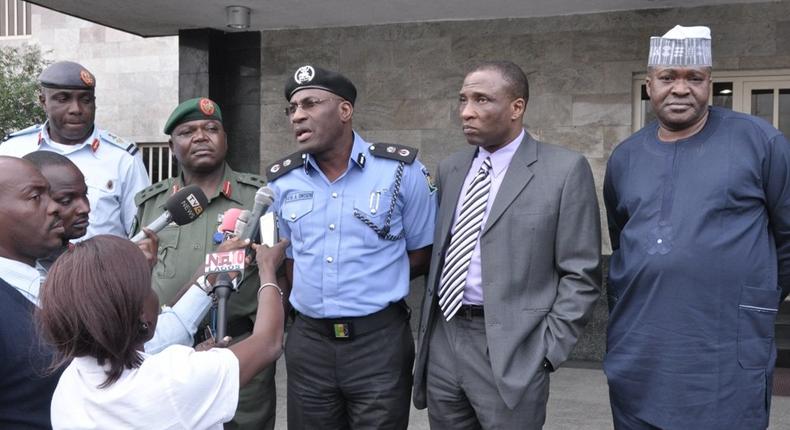 Lagos State Commissioner of Police, Mr. Fatai Owoseni (middle) addressing the media