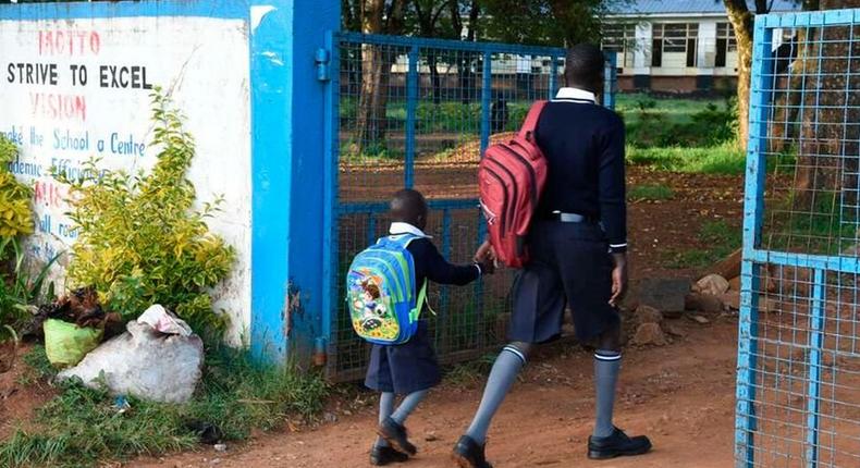 Meet 27-year-old Isaac Chol who attends same school as his 6-year-old son 