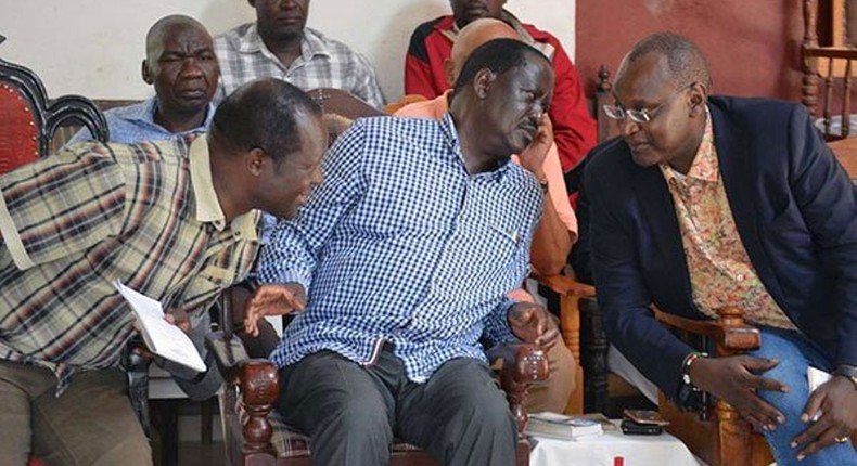 Jubilee Sec-Gen Raphael Tuju (L) AU Envoy Raila Odinga and Muhoho Kenyatta