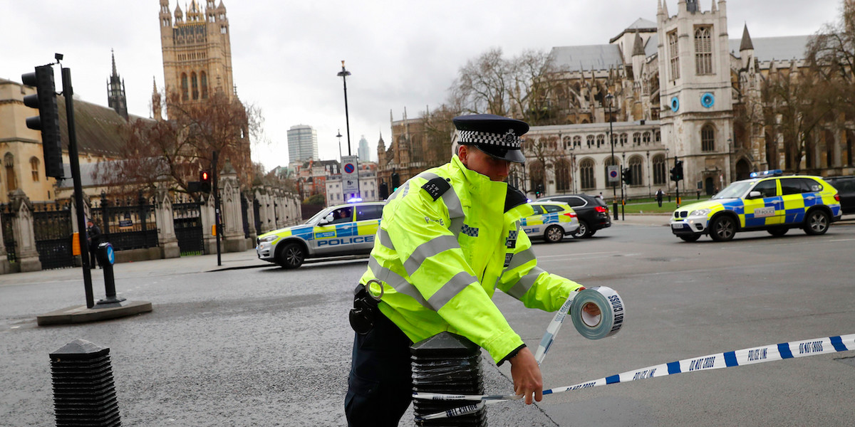 Police tapes off Parliament Square after reports of loud bangs, in London, Britain, March 22, 2017.
