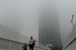 UNCLEAR Heavy fog in Tianjin, China. The country officially plans to become “carbon neutral by 2060, but climate experts aren’t satisfied