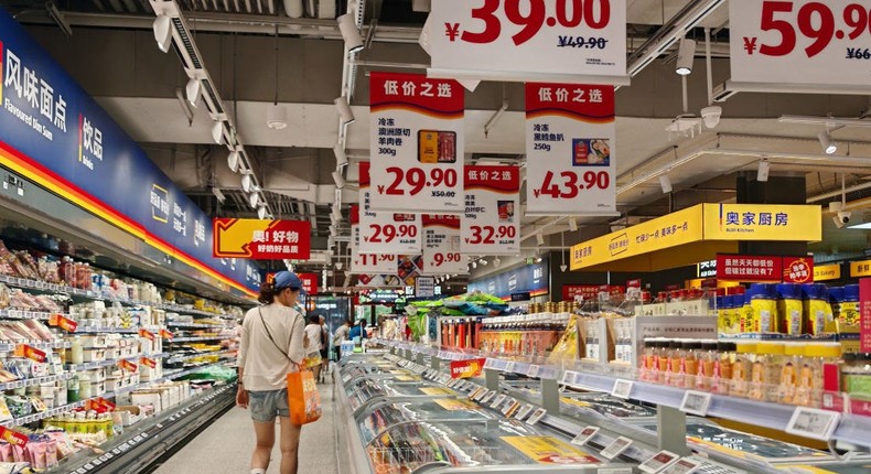 Residents select products at a supermarket in Shanghai, China.CFOTO/Future Publishing/Getty Images