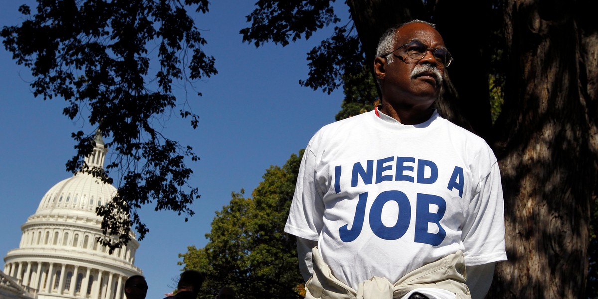 Mervin Sealy from Hickory, North Carolina, takes part in a protest rally outside the Capitol Building in Washington, October 5, 2011. Demonstrators were demanding that Congress create jobs, not make budget cuts during the protest.