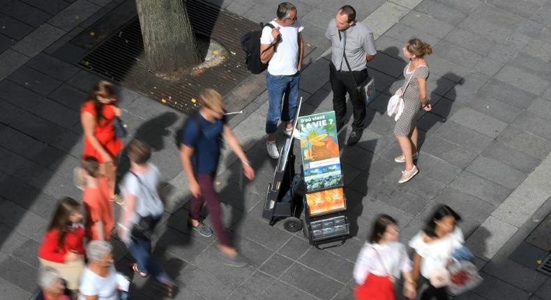 Jehovah's Witnesses display brochures in the French city of Nantes in 2018