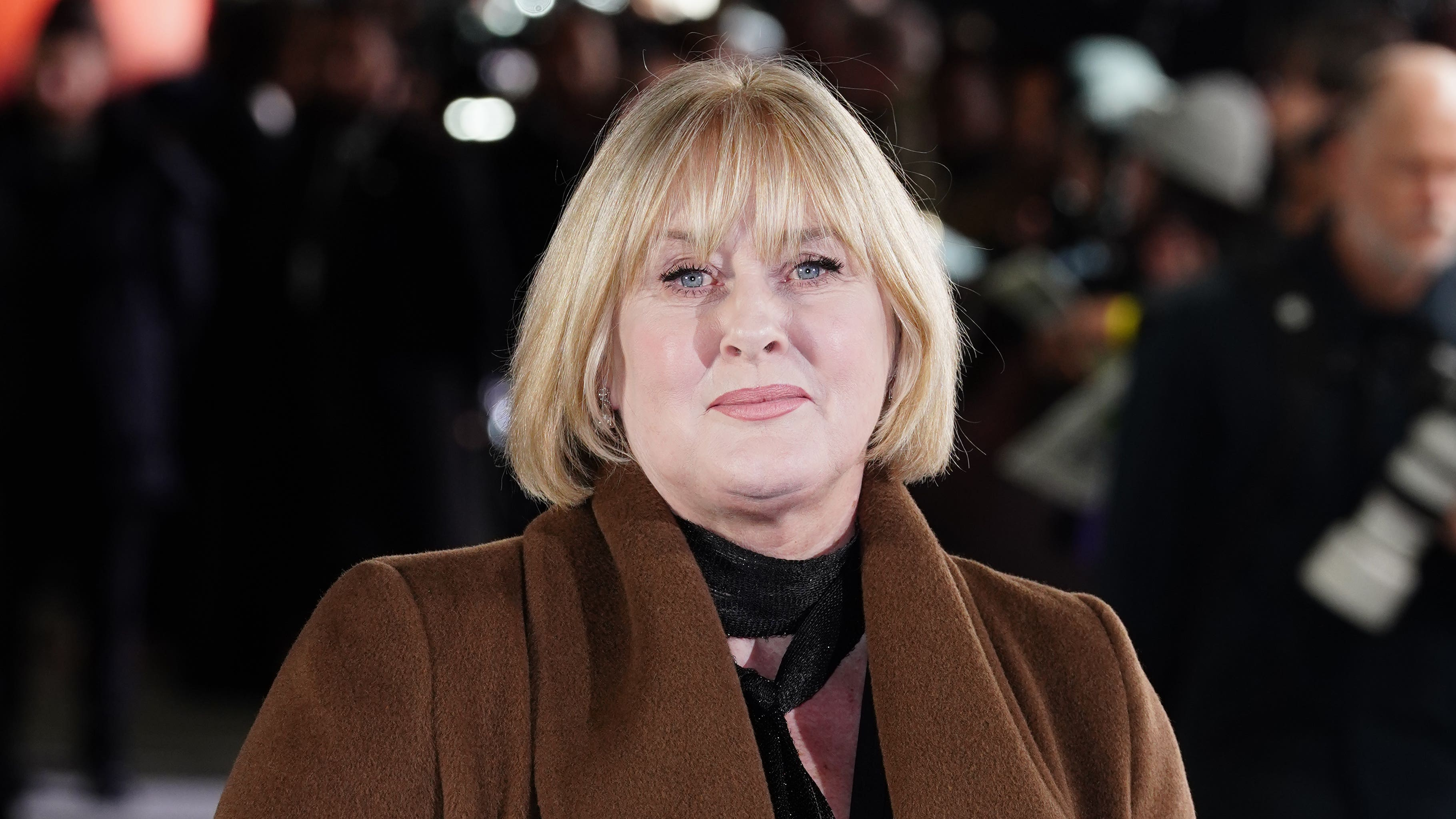 Sarah Lancashire receives CBE at Windsor Castle ceremony