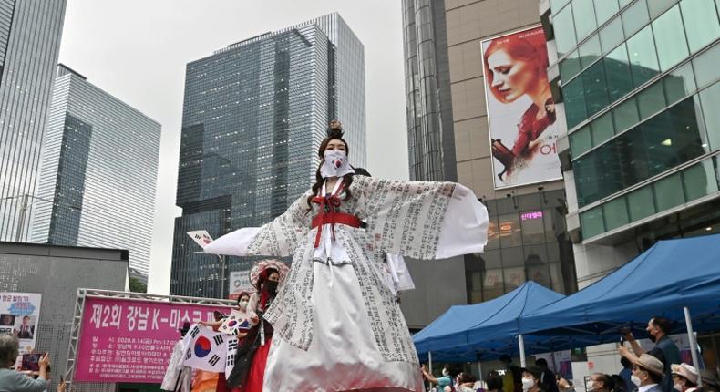 South Korea endured one of the worst early outbreaks of the coronavirus but largely brought it under control with extensive testing and the public following measures like face masks