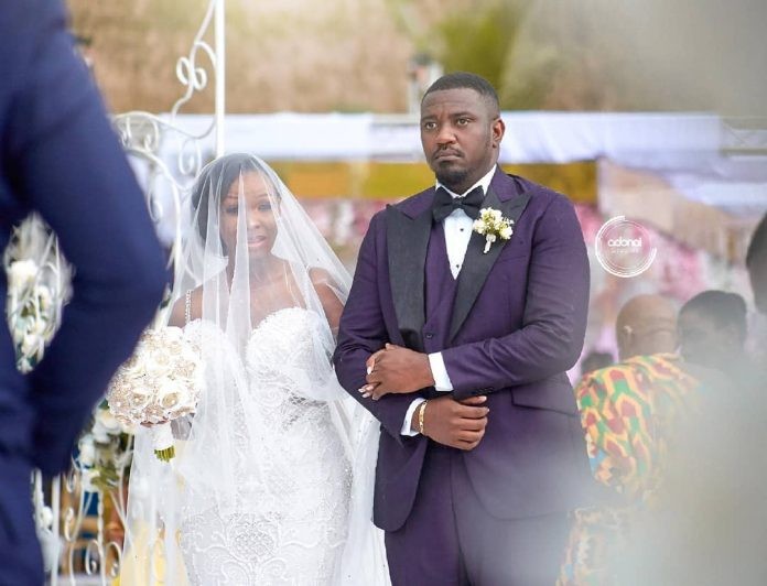 John Dumelo and wife