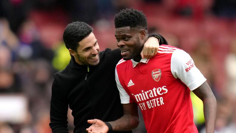 Thomas Partey with Arsenal manager Mikel Arteta