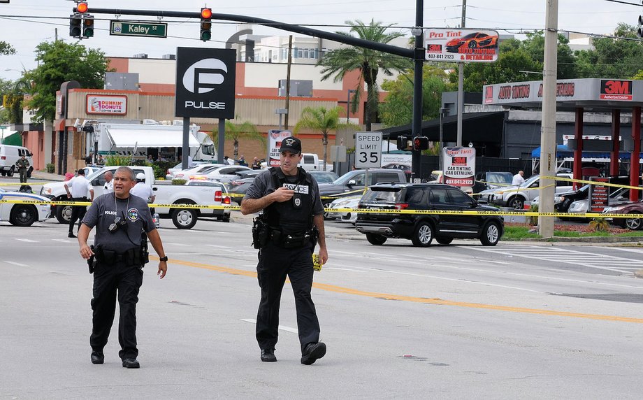 Orlando police officers seen outside of Pulse nightclub after a fatal shooting and hostage situation where 50 people died on June 12, 2016 in Orlando, Florida.