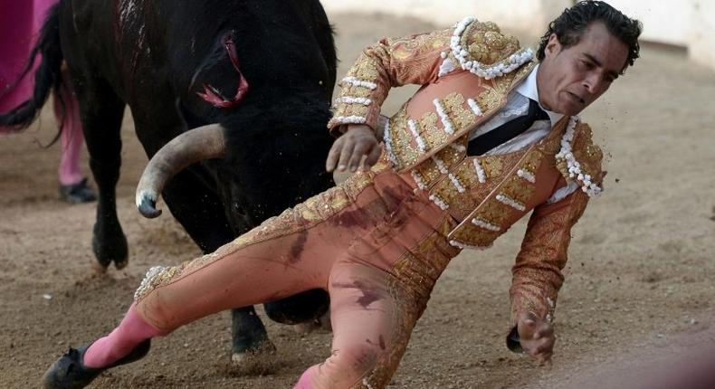 Spanish matador Ivan Fandino is impaled by a Baltasar Iban bull during a bullfight at the Corrida des Fetes on June 17, 2017 in Aire sur Adour, southwestern France