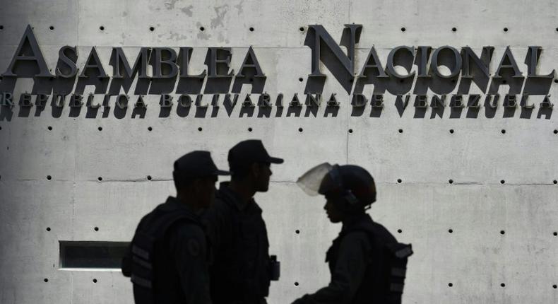 Members of Venezuela's Bolivarian National Guard outside the Federal Legislative Palace, which houses both the opposition-led National Assembly and the pro-government National Constituent Assembly, in Caracas on May 15, 2019