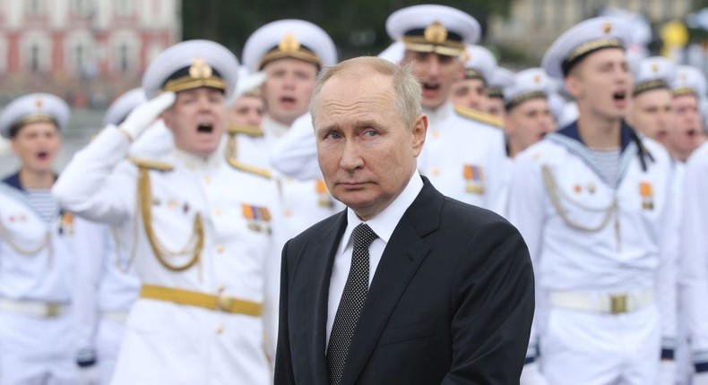 Russian President Vladimir Putin looks to Naval officers during the Navy Day Parade, on July, 31 2022, in Saint Petersburg, Russia.Contributor/Getty Images