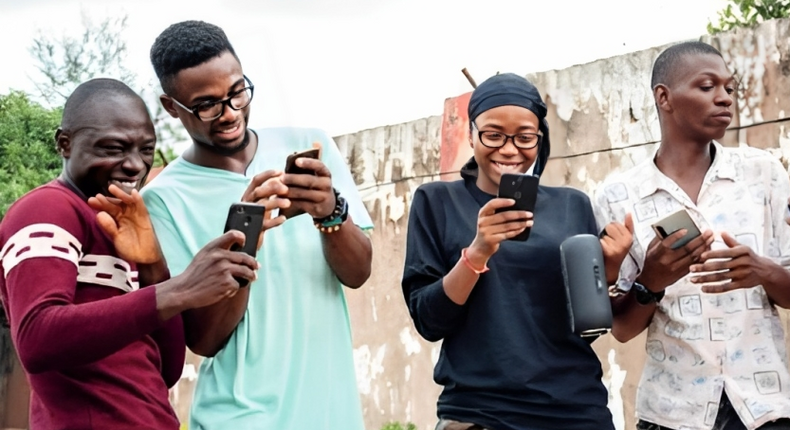 Young people using their mobile phones 