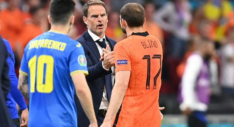 Netherlands' defender Daley Blind and coach Frank de Boer both worked with Christian Eriksen at Ajax Creator: JOHN THYS