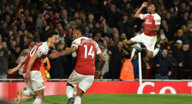 Pierre-Emerick Aubameyang celebrated with Mesut Ozil as Arsenal saw off Leicester