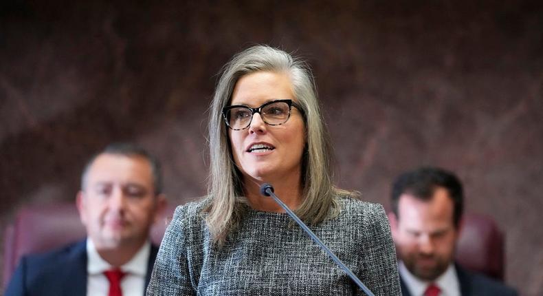 Gov. Katie Hobbs of Arizona delivers her State of the State address, flanked by Arizona House Speaker Ben Toma, left, and Arizona Senate President Warren Petersen, right, at the Arizona state Capitol in Phoenix.AP Photo/Ross D. Franklin, File