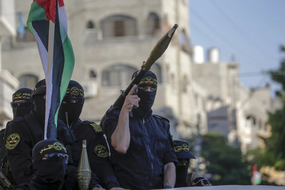 Borci brigade Al Kuds, oružanog krila Islamskog džihada tokom parade u Gaza Sitiju 5. avgusta 2022.