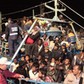 lampedusa imigranci przypływają