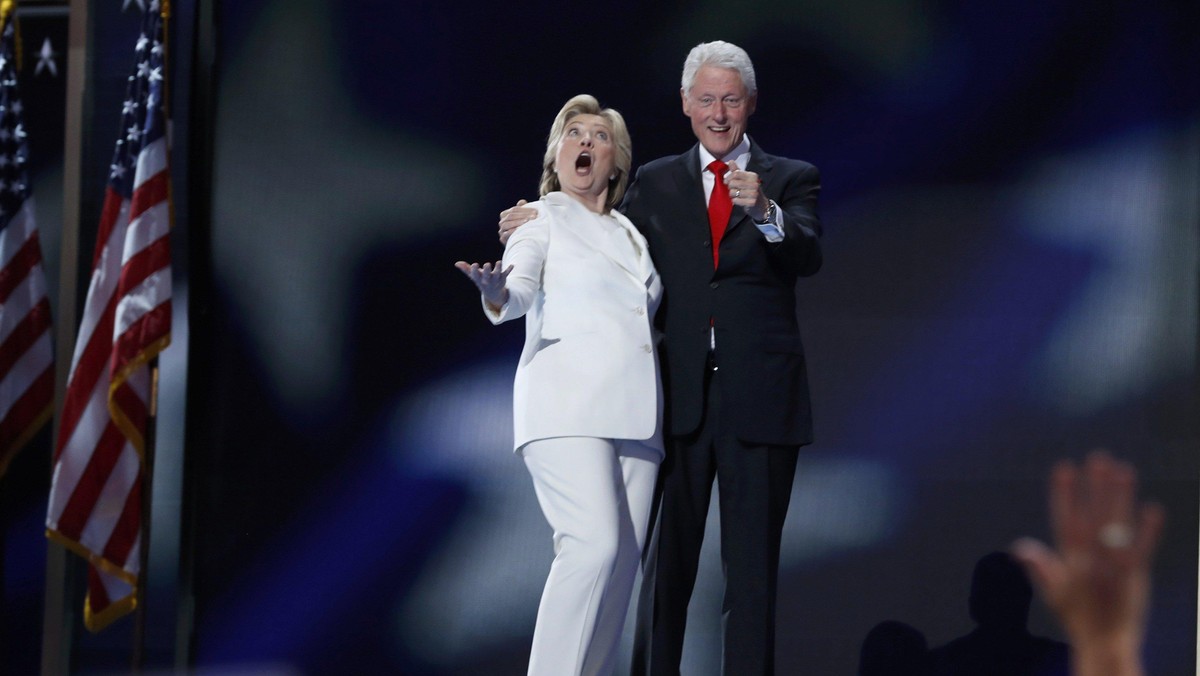 Democratic presidential nominee Hillary Clinton and her husband former president Bill Clinton react 