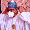Buhari signs regulations to compel the use of face masks in public spaces