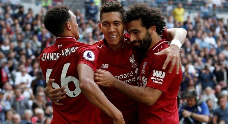 Roberto Firmino (centre) scored the decisive goal for Liverpool in their 3-2 Champions League win against Paris Saint-Germain