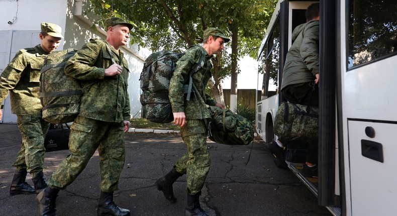 Russian recruits take a bus near a military recruitment center in Krasnodar, Russia, Sunday, Sept. 25, 2022.