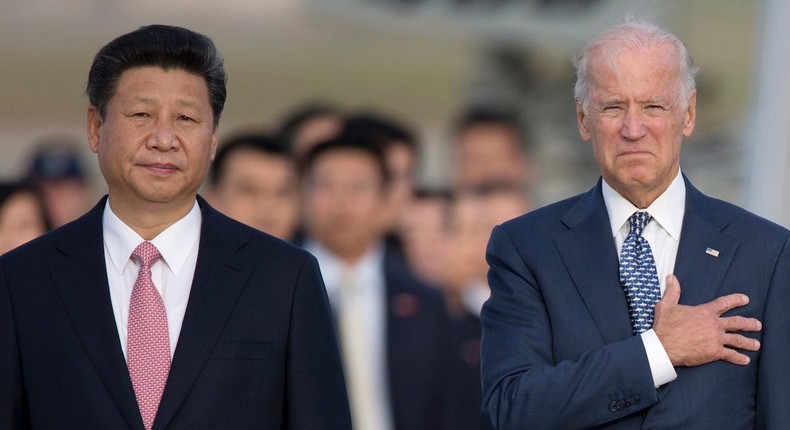 Chinese President Xi Jinping, then-Vice President Joe Biden, Peng Liyuan and Jill Biden stand for the US National Anthem at Andrews Air Force Base in Maryland, September 24, 2015.