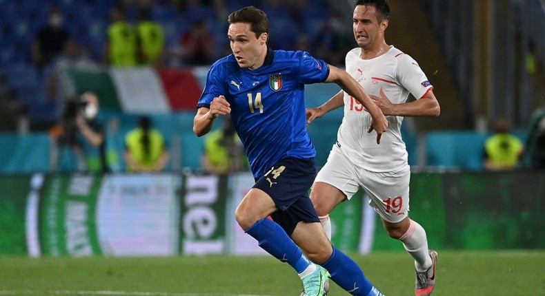 Italy winger Federico Chiesa (L) has appeared as a substitute in his side's first two group games Creator: ANDREAS SOLARO