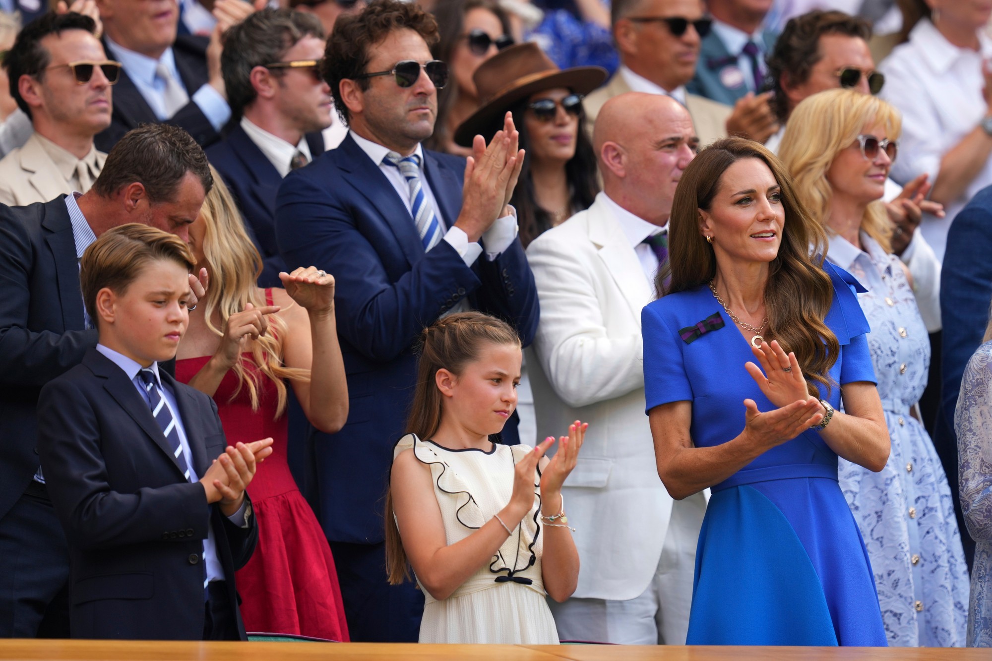 Britský princ William, princezná z Walesu Kate, princ George a princezná Charlotte na tenisovom šampionáte vo Wimbledone v Londýne.