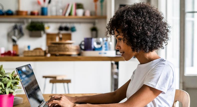 woman using computer at home