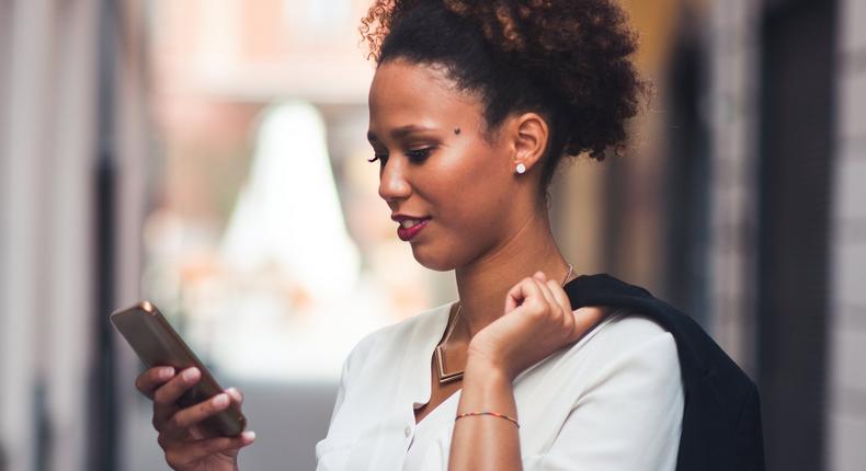 woman using iphone