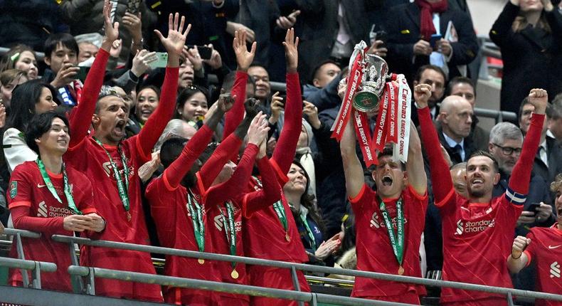 Liverpool celebrate winning the League Cup Creator: JUSTIN TALLIS