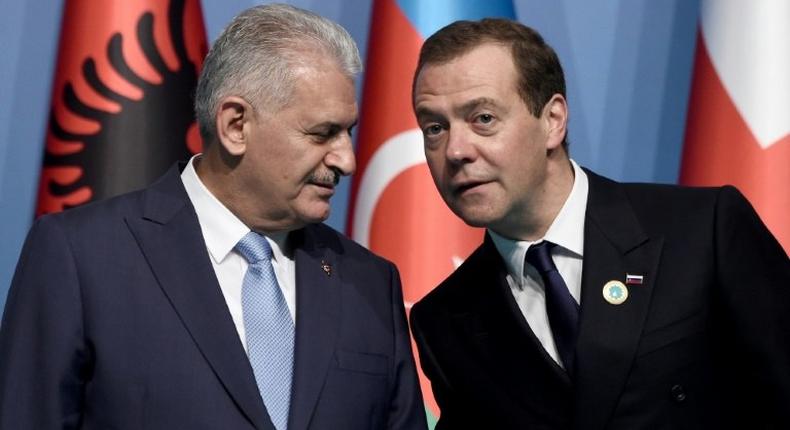 Turkish Prime Minister Binali Yildirim (left) and Russian Prime Minister Dmitry Medvedev pictured at a summit of Black Sea regional leaders in Istanbul on May 22, 2017