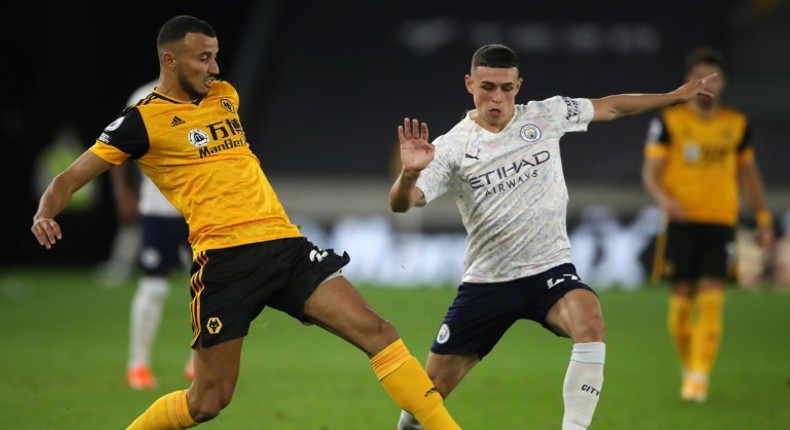 Manchester City midfielder Phil Foden (R) scored in his side's win at Wolves