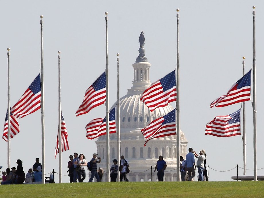 U.S. flags on the grounds of the Washington Monument are lowered to half-staff, on October 2, 2017 in Washington, DC. President Donald Trump ordered the flags on all federal buildings to fly at half-staff following the mass shooting that left more than 50 dead in Las Vegas.