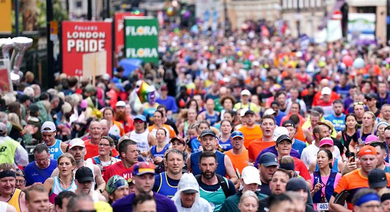 Runners pass through Greenwich during the 2023 TCS London Marathon.Zac Goodwin/PA Images via Getty Images