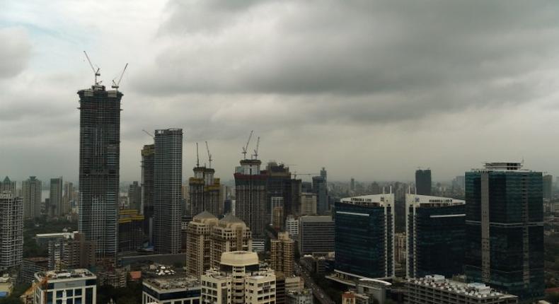 Dark clouds gather over India's financial capital of Mumbai during the monsoon season, when building collapses across the country become more common