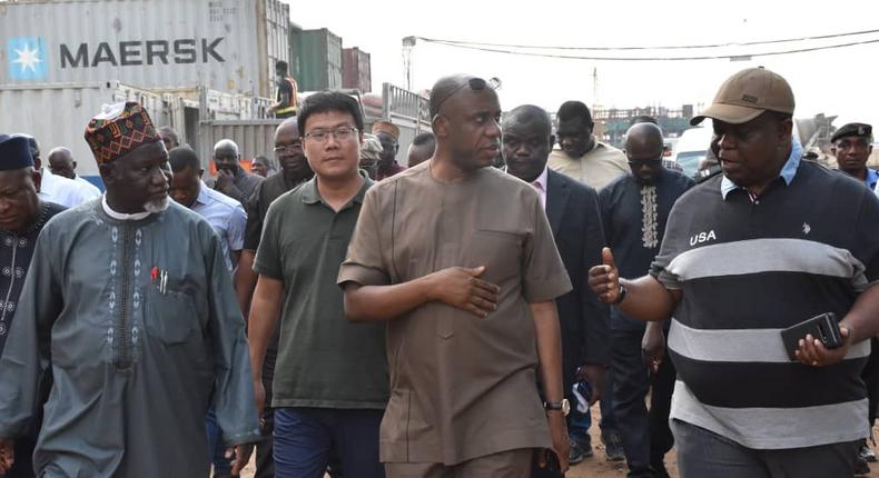 From Left, Chairman Board Of Directors Nigerian Railway Corporation, Malam Ibrahim Al-Hassan Musa, Project Manager, CCECC, Mr Li Depeng, Minister Of Transportation, Rotimi Amaechi And Managing Director Nigerian Railway Corporation,Mr Fidet Okhiria during the inspection Of Lagos-Ibadan Standard Guage Rail in Lagos on Saturday (NAN)