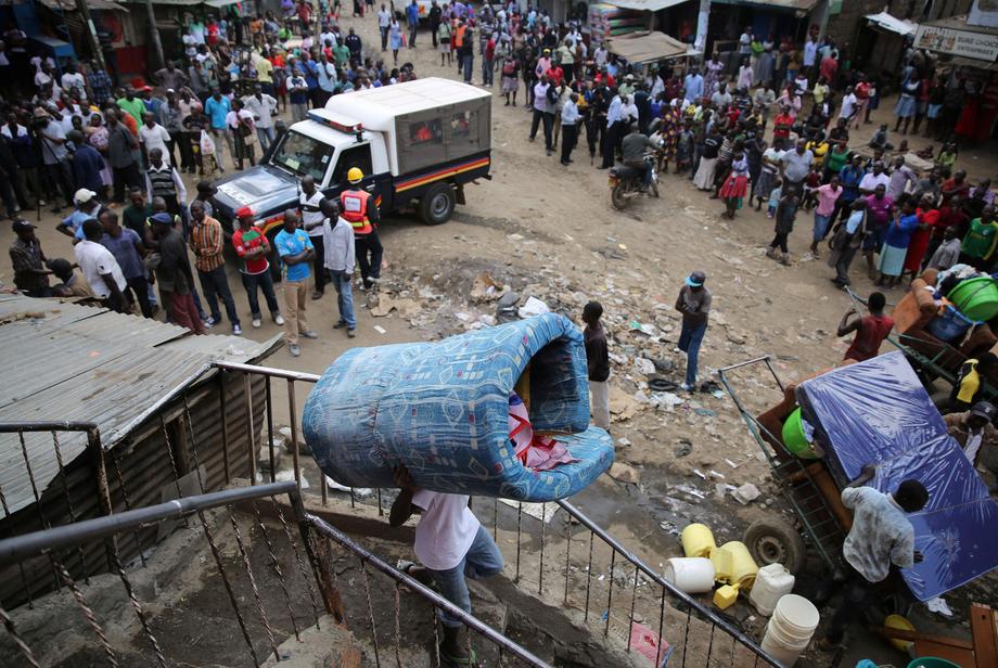 The Wider Image: Tearing down condemned homes in Nairobi