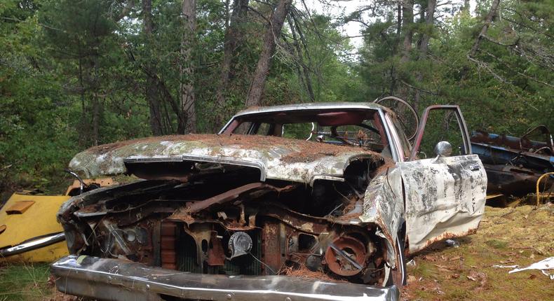 A rusted car.