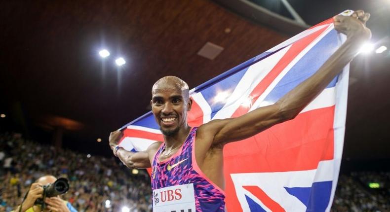 Britain's Mo Farah celebrates after winning the men's 5000m event during the IAAF Diamond League Athletics Weltklasse meeting in Zurich on August 24, 2017