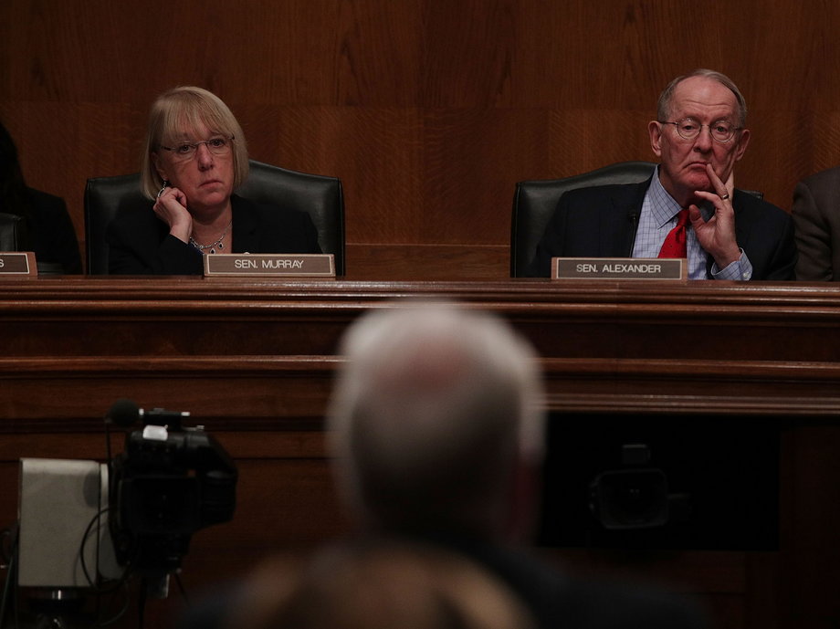 Committee chairman Sen. Lamar Alexander (R-TN) (2nd L) and ranking member Sen. Patty Murray (D-WA) (L) listen during a confirmation hearing of Health and Human Services Secretary Nominee Rep. Tom Price