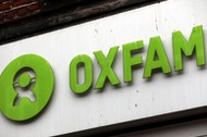 A sign is seen above a branch of Oxfam, in central London