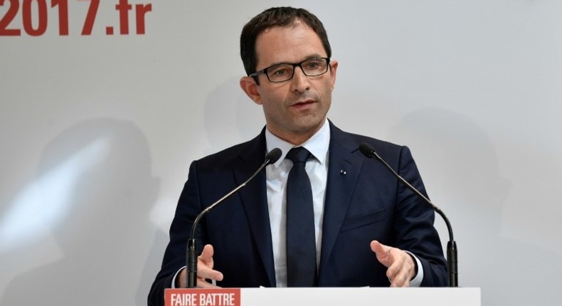 French presidential election candidate for the left-wing French Socialist party Benoit Hamon addresses the press on March 29, 2017, following announcement by former prime minister Manuel Valls he will endorse the presidential bid of Emmanuel Macron