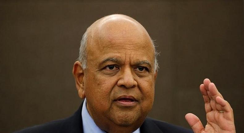 South African Finance Minister Pravin Gordhan reacts during a media briefing in Sandton near Johannesburg March 14, 2016. 