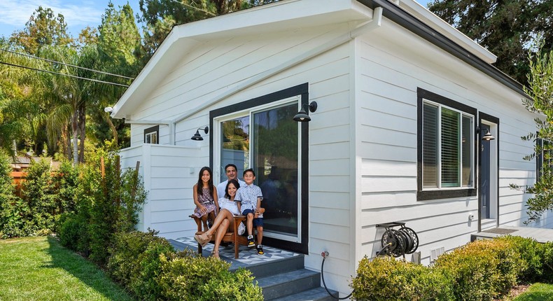 The Kantor family sits outside their completed ADU in their LA backyard.Villa