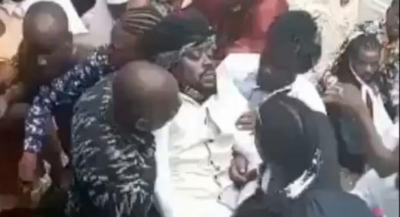 Beenie Man faints at Mother's funeral