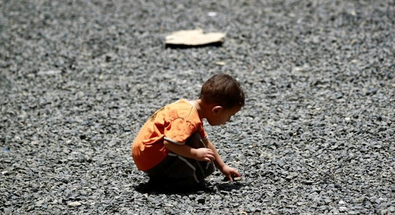 A displaced child is seen in Yemen in August 2015, where the UN says it needs $4.4 billion in emergency famine relief funding, among other countries