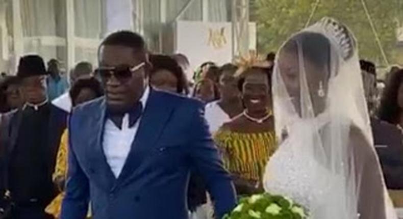 Dr. Osei Kwame Despite and beautiful bride