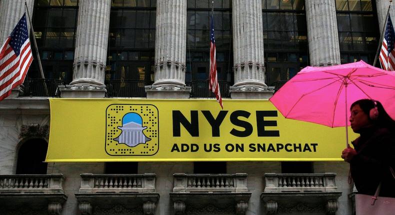 A Snapchat sign hangs on the facade of the New York Stock Exchange (NYSE) in New York City, U.S., January 24, 2017